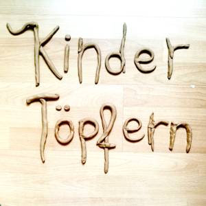 Schriftzug aus Ton